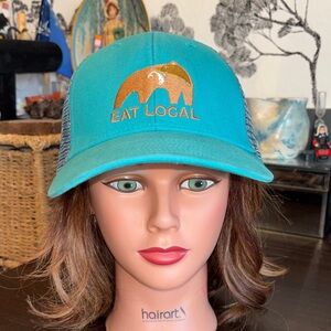 PATAGONIA Teal eat local with a bear and a fish in its mouth hat with mesh backi